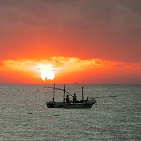 Boat Fishing at Sunset